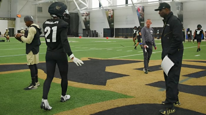 Deion Sanders talking to Shilo Sanders out on CU practice field